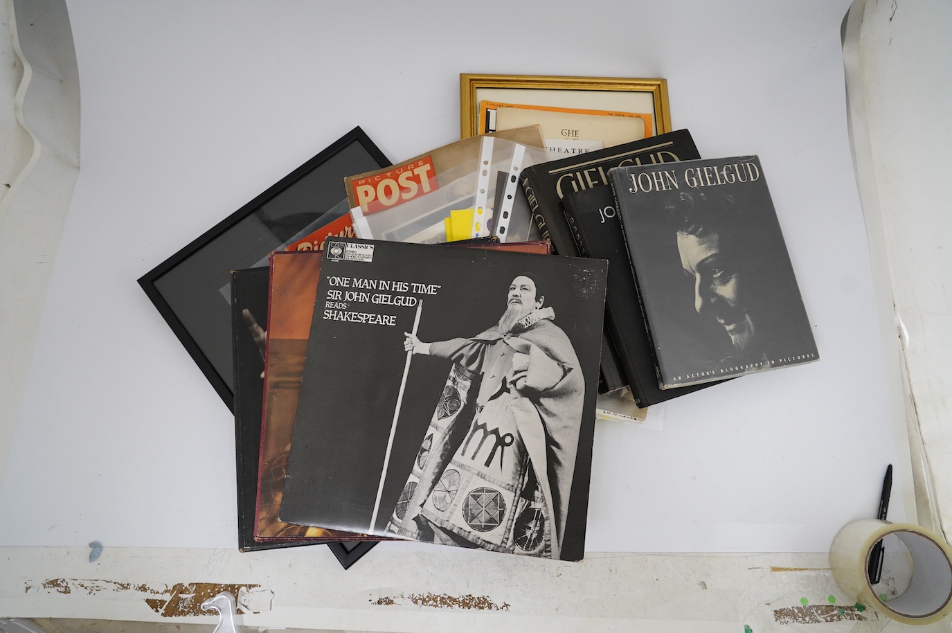 A theatrical archive of signed photos, a poster and books relating to John Gielgud and Laurence Olivier, including; a framed signed photograph of John Gielgud as Hamlet dated 1935, together with two signed photographs da